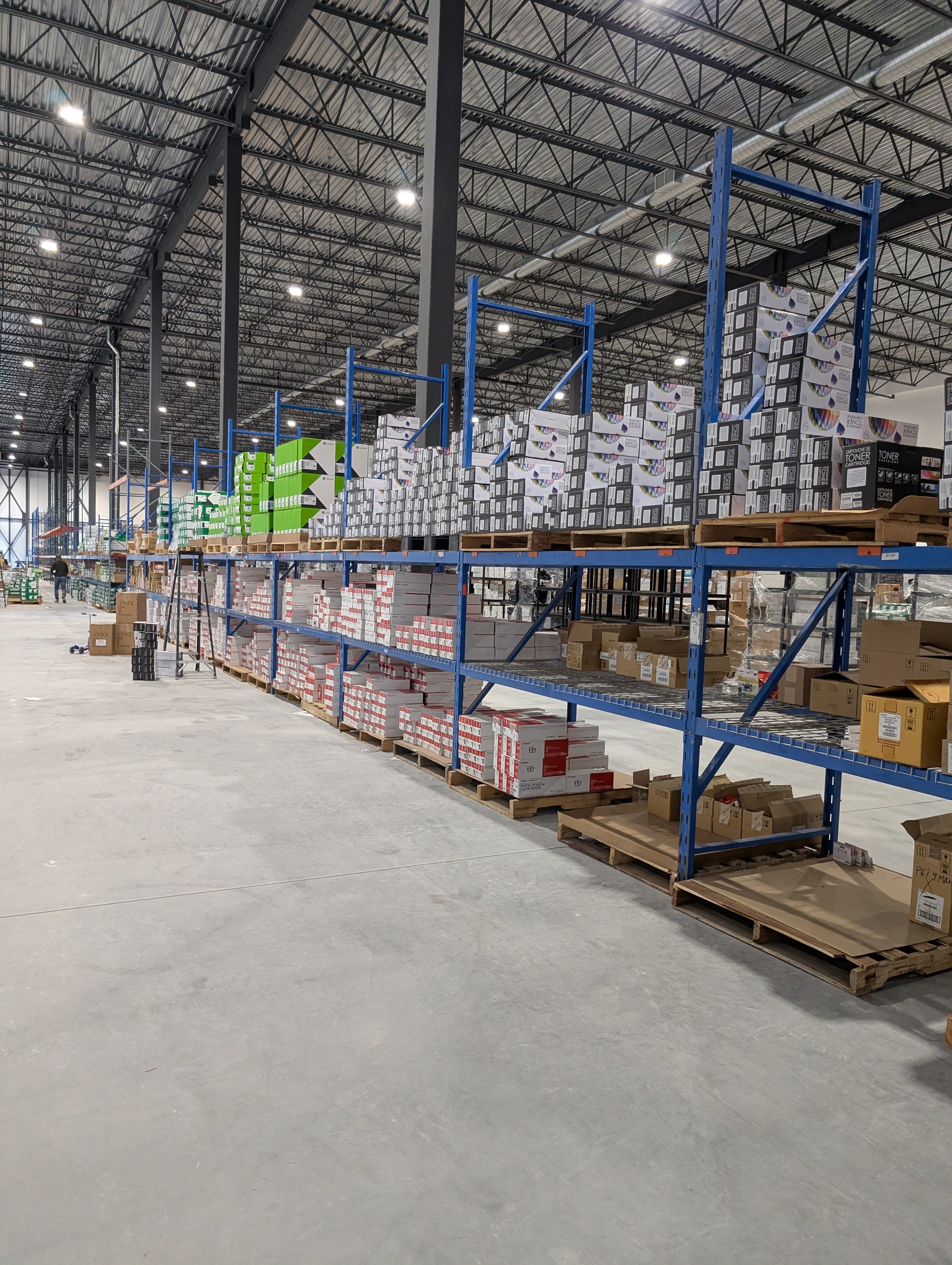 Pallet racking with boxed product in a warehouse
